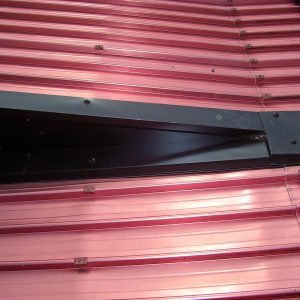 copertura_con_lastre_grecate_in_alluminio_color_rame_grest